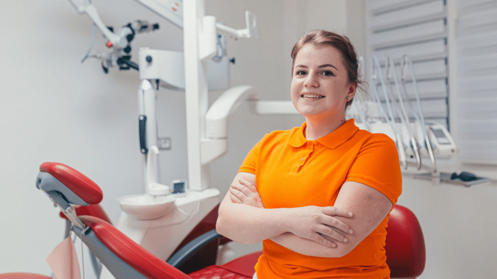 Female Glendale dentist standing while explaining how often you should visit a dentist in Glendale