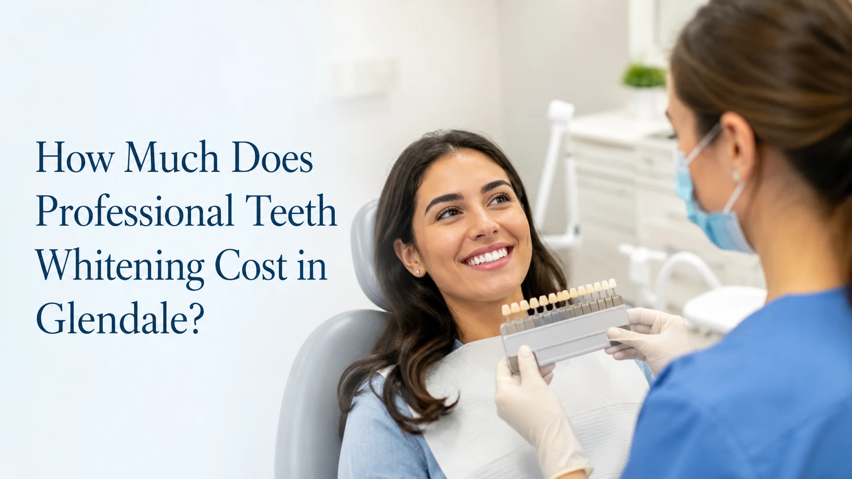 Dentist discussing professional teeth whitening with a patient in Glendale and comparing tooth shades during a whitening consultation.